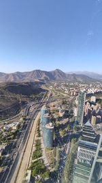 High angle view of road amidst buildings in city