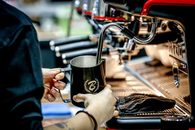 Close-up barista milk steaming