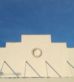 Low angle view of building against blue sky