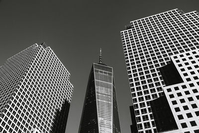 Low angle view of skyscrapers against sky