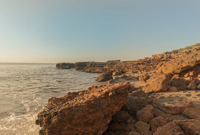Scenic view of sea against clear sky