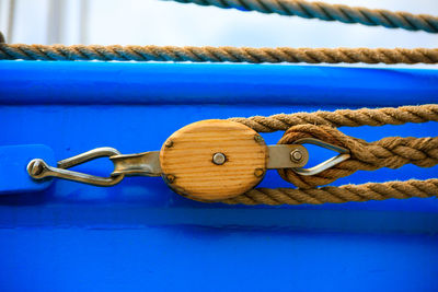 Close-up of rope with pulley on boat