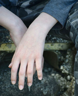 High angle view of hands