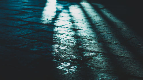 High angle view of shadow on floor
