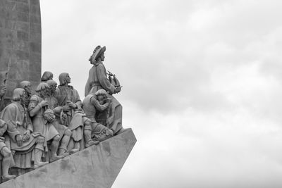 Low angle view of statue against sky