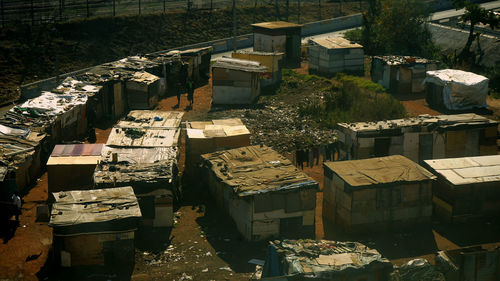 Pair taking a walk in the informal settlements of johannesburg, south africa.