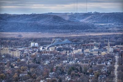 Aerial view of cityscape against sky
