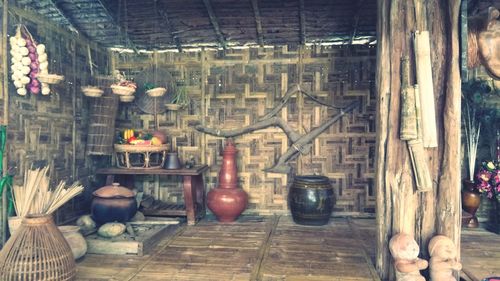 Potted plants hanging against wall