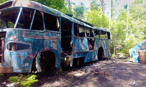 Abandoned truck in forest