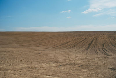 Scenic view of desert against sky