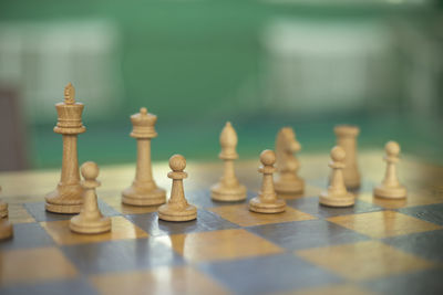 Close-up of chess pieces on board