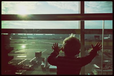 Silhouette of girl looking at view