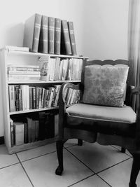 Stack of books on shelf at home