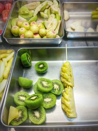 High angle view of various fruits in trays