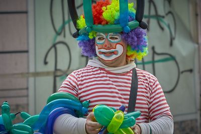 Portrait of happy boy with balloons