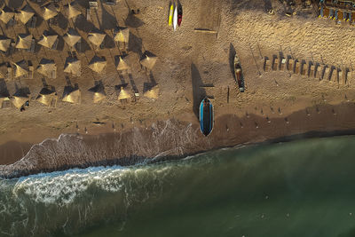 Aerial view of beach umbrellas on seashore