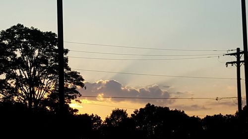 Low angle view of electricity pylon