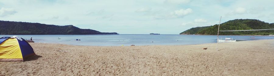 Scenic view of beach against sky