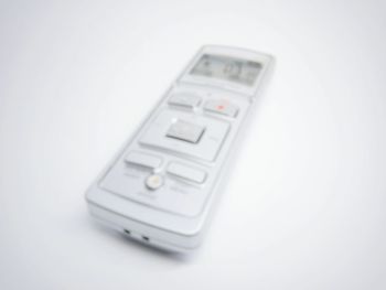 Close-up of telephone over white background