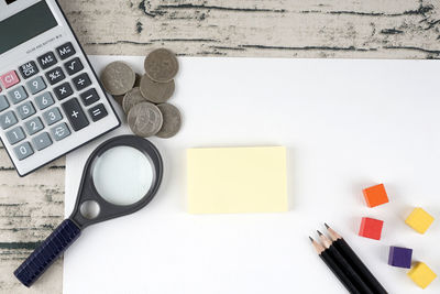 High angle view of pen on table against white background