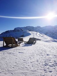 Scenic view of landscape against clear sky during winter