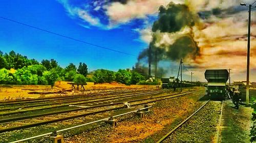 Railroad track against sky