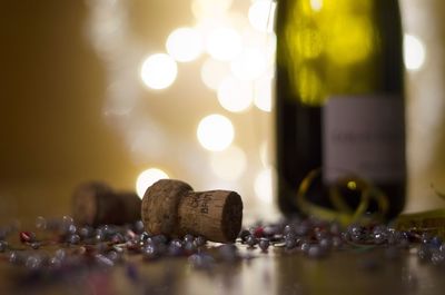 Close-up of wine bottles on table