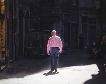 Full length of woman standing in city