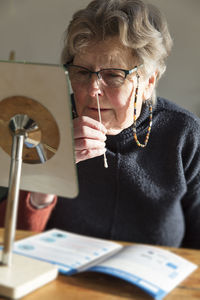 Senior woman doing medical test