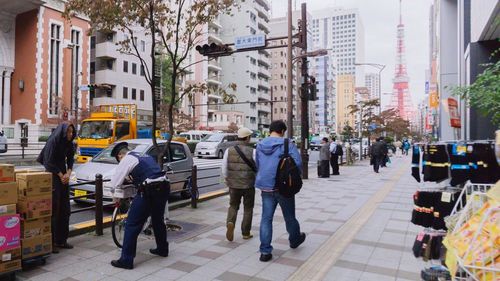 People walking on sidewalk