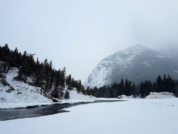 Scenic view of mountains against sky during winter