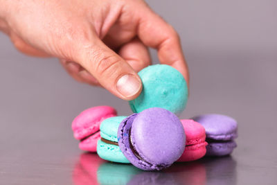 Close-up of hand holding ice cream