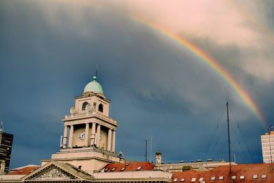 Low angle view of rainbow against sky