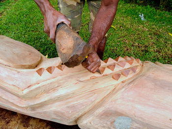 High angle view of man working on wood