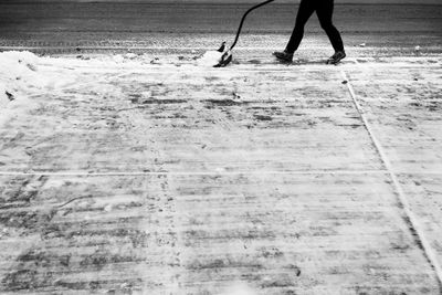 Low section of man on sand