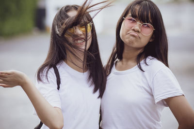 Portrait of friends wearing sunglasses