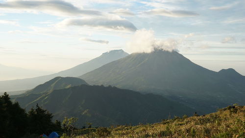 Panoramic view of volcanic landscape against sky