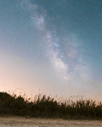 Scenic view of star field against sky