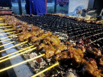 Close-up of meat on barbecue grill