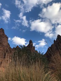 Low angle view of rocks against sky