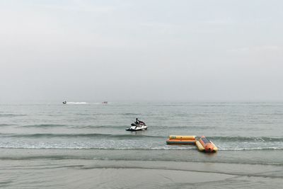 Nautical vessel on sea against sky