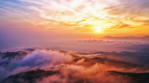 Scenic view of cloudscape against sky during sunset