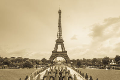 Eiffel tower against sky during sunset