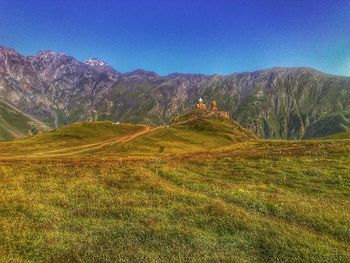 Scenic view of mountain range against sky