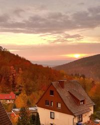 High angle view of townscape against sky during sunset