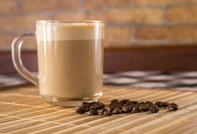 Close-up of coffee cup on table