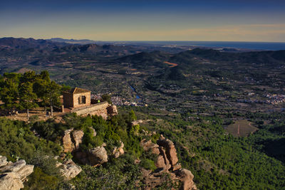 High angle view of landscape and buildings against sky