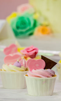Close-up of cupcakes on table