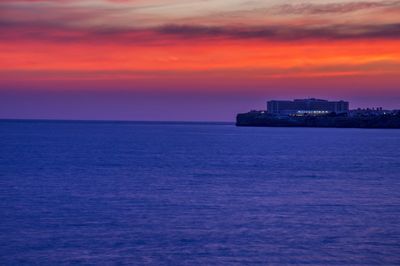 Scenic view of sea at sunset