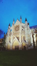 Low angle view of cathedral against blue sky